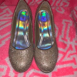 Silver slipper gold heels